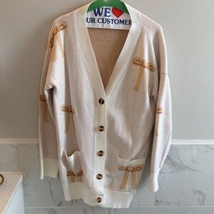 Women's Cream Cardigan with Bow Accents